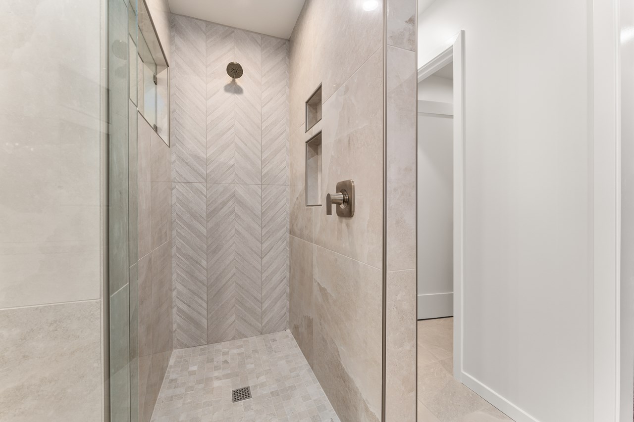 the primary suite walk-in shower.