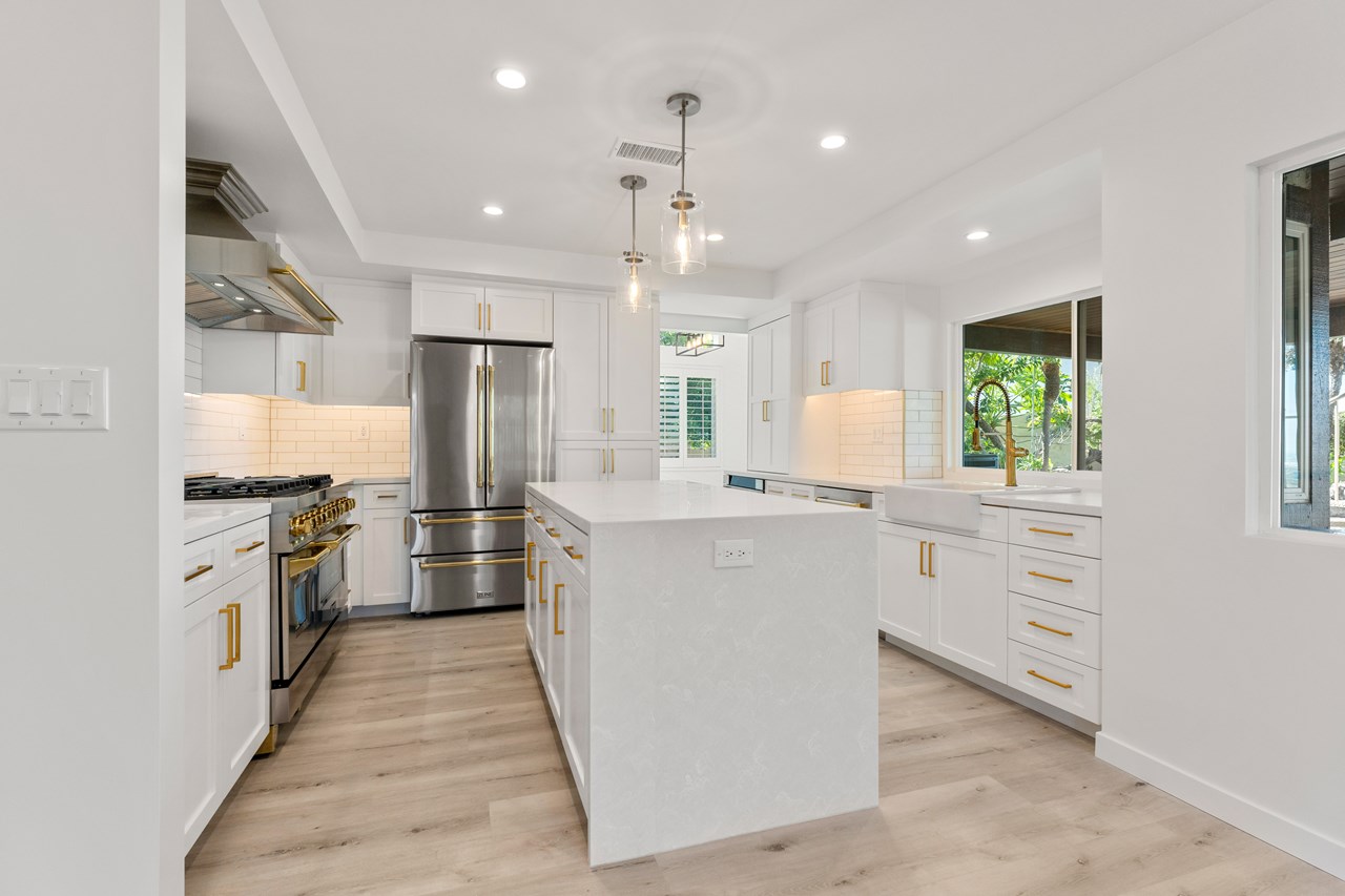 the kitchen features all new appliances and custom cabinets. the fridge features two large freezer drawers with internal ice maker. the microwave is drawer style and the dishwasher features three racks.